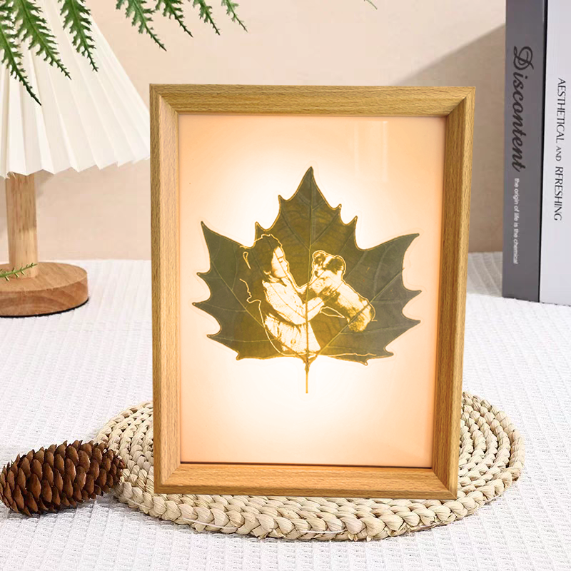 Handcrafted leaf carving portrait of a pet dog, framed as a personalized back-to-school gift for pet owners, eco-friendly and perfect for dorm room decoration.