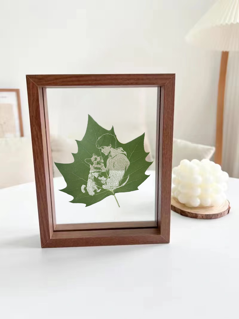 Custom pet portrait leaf sculpture showing a dog dad with his beloved dog – personalized memorial artwork